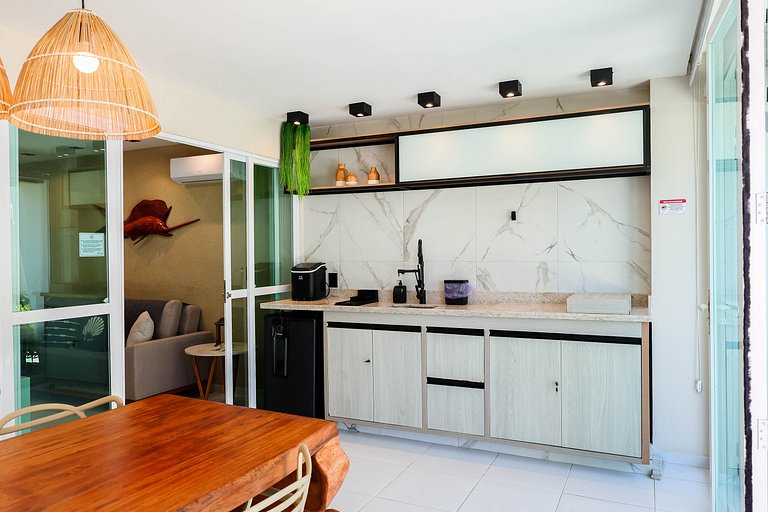 Flat Térreo Frente à Piscina com varanda gourmet