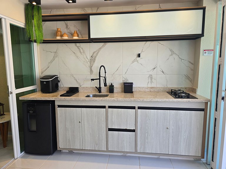 Flat Térreo Frente à Piscina com varanda gourmet - Flat 104