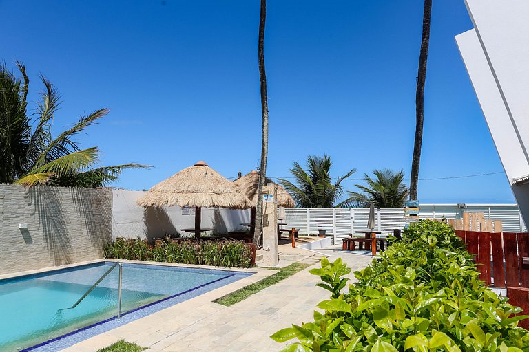 Flat Térreo Frente à Piscina com varanda gourmet - Flat 103