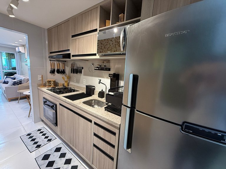 Flat Térreo Frente à Piscina com varanda gourmet