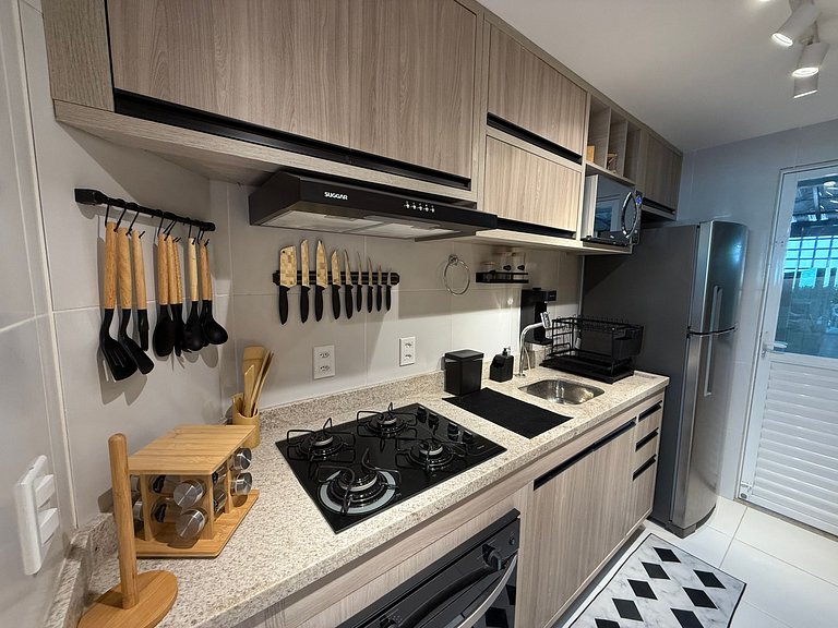 Flat Térreo Frente à Piscina com varanda gourmet - Flat 103